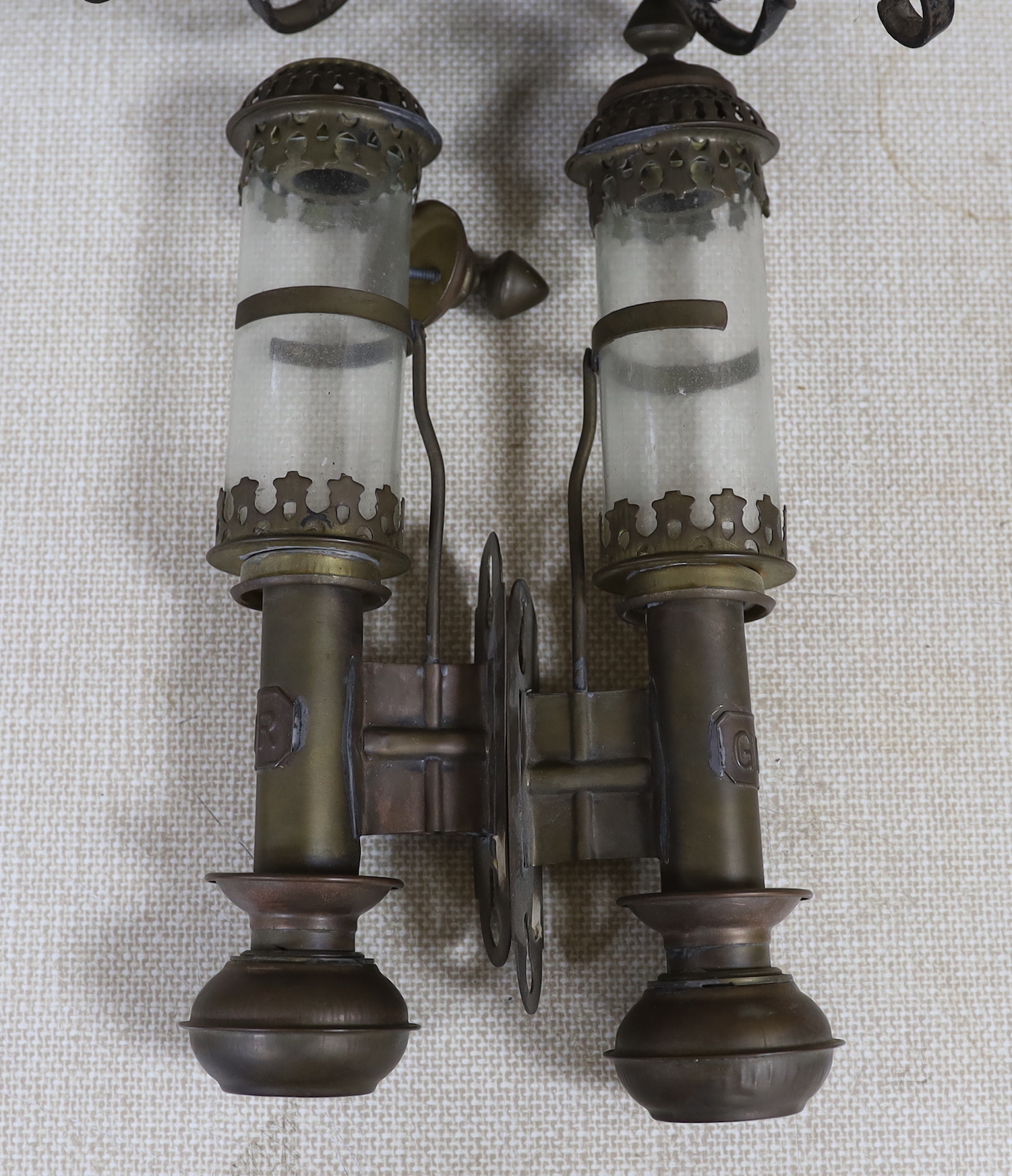 A pair of GWR railway lamps and a wrought iron hanging lantern, largest each 35cm high